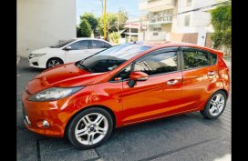 Orange Ford Fiesta 2013 Hatchback for sale in Quezon City