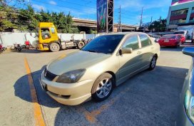 Beige Mitsubishi Lancer 2010 for sale in Parañaque City