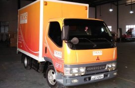 Sell Orange 2006 Mitsubishi Fuso in San Vicente