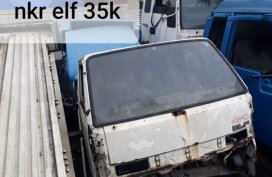 Selling White Isuzu Elf 2020 in Manila