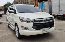 Selling Pearl White Toyota Innova 2017 in Quezon City