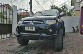 Sell Black 2012 Mitsubishi Strada in Bamban