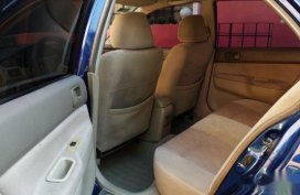 Selling Blue Mitsubishi Lancer 2004 Hatchback in Manila