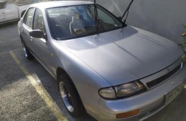 Silver Nissan Almera for sale in Manila