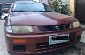 Sell Purple Mazda Familia in Caloocan