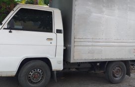 Sell White Mitsubishi L300 in Cagayan de Oro