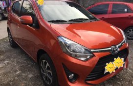 Selling Orange Toyota Wigo in Dasmariñas