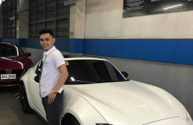 Sell White Mazda 2 in Pasig