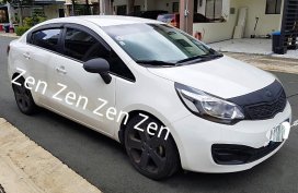 Sell White Kia Rio in Quezon City
