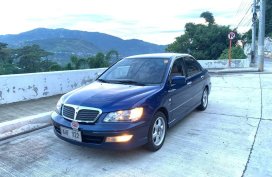 Selling Blue Mitsubishi Lancer for sale in Manila