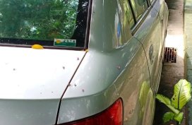 Selling White Kia Rio in Quezon City