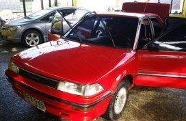 Selling Red Toyota Corolla in Quezon City