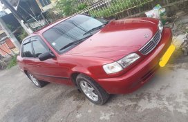 Sell Red Toyota Corolla in Quezon City