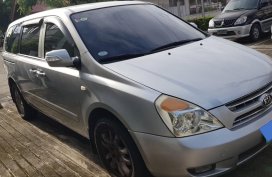 Selling Silver Kia Carnival 2010 Van in Manila
