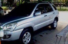 Sell Silver Kia Sportage in Muñoz