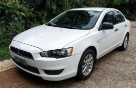 Selling White Mitsubishi Lancer ex in Taguig