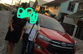 Selling Red Toyota Innova in Manila