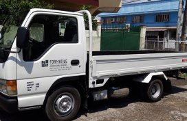 Sell White Isuzu Elf in Manila