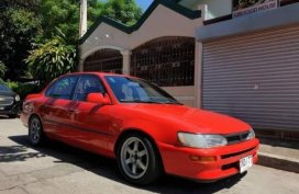 Selling Red Toyota Corolla in Quezon City