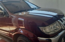 Dark Red Isuzu Sportivo 2012 at good price for sale in Tagum City
