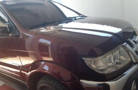 Dark Red Isuzu Sportivo 2012 at good price for sale in Tagum City