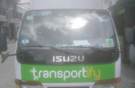 White Isuzu Elf for sale in Manila