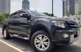 2015 Black 3.2L Ford Ranger WildTrak 4x4 (A/T; Top of the Line)