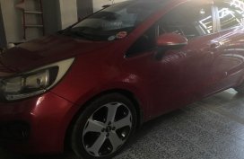 Selling Red Kia Rio in Angeles