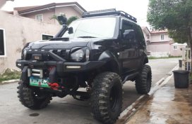 Selling Black Suzuki Jimny 2014 in Quezon City