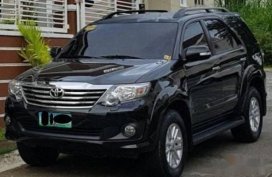 Black Toyota Fortuner 2013 SUV Automatic for sale in Manila