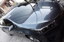 Sell Black Toyota Corolla altis in Quezon City