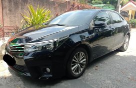 Sell Black 2015 Toyota Corolla Altis in Quezon City