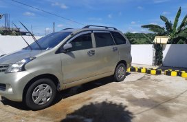 Selling Gold Toyota Avanza 2013 Van in Cavite City