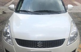 Sell White Suzuki Swift in Quezon City