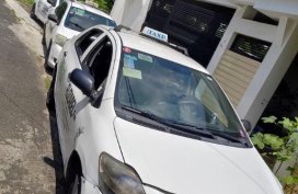 Selling White Toyota Vios in Quezon City