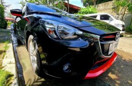 Selling Black Mazda 2 2016 in Quezon City