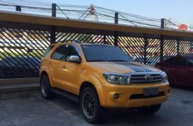 Yellow Toyota Fortuner 2009 for sale in Quezon City