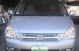 Silver Kia Carnival for sale in Pasig