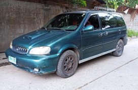 Blue Kia Carnival for sale in Las Piñas
