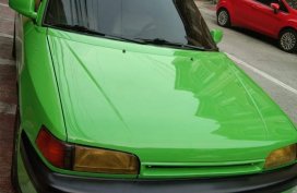 Green Mazda Familia for sale in Manila