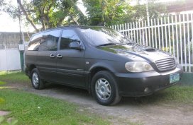 Sell Black Kia Carnival in Iligan
