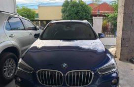 Selling Blue Bmw X1 in Parañaque