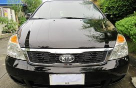 Black Kia Carnival 2012 for sale in Pasig