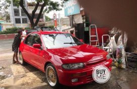 Red Mazda 323 1996 for sale in Quezon City