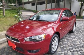 Red Mitsubishi Lancer 2013 for sale in Quezon City