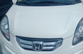 White Honda Brio Amaze 2016 for sale in Quezon City