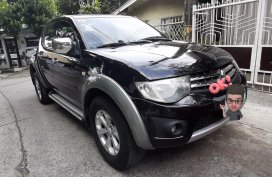 Black Mitsubishi Strada 2010 for sale in Rizal
