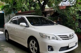 Sell Pearl White 2011 Toyota Corolla Altis in Manila