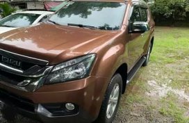 Isuzu MU-X 2015 ( outback brown )