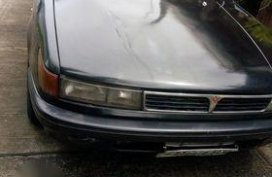 Black Mitsubishi Lancer 2004 for sale in Calamba